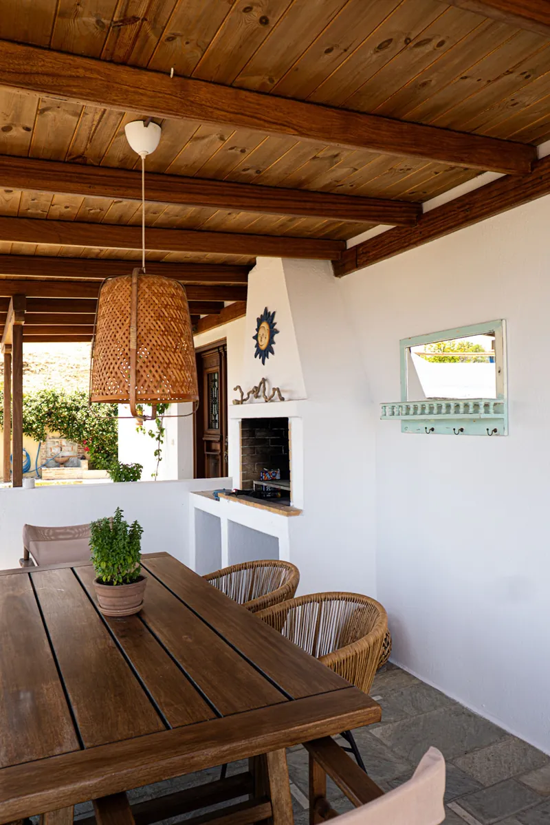 The built barbecue and the terrace table
