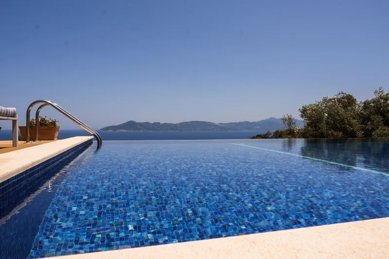 The infinity edge of the pool against the sea