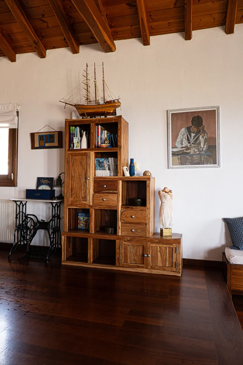 Shelves and a chair in the living room