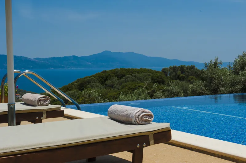 The pool and the mountains across the water