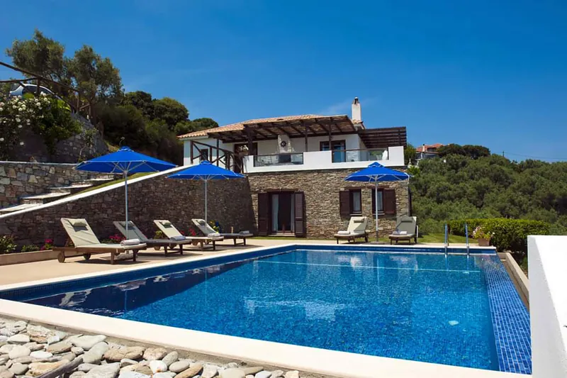 The villa and its pool among the olive trees
